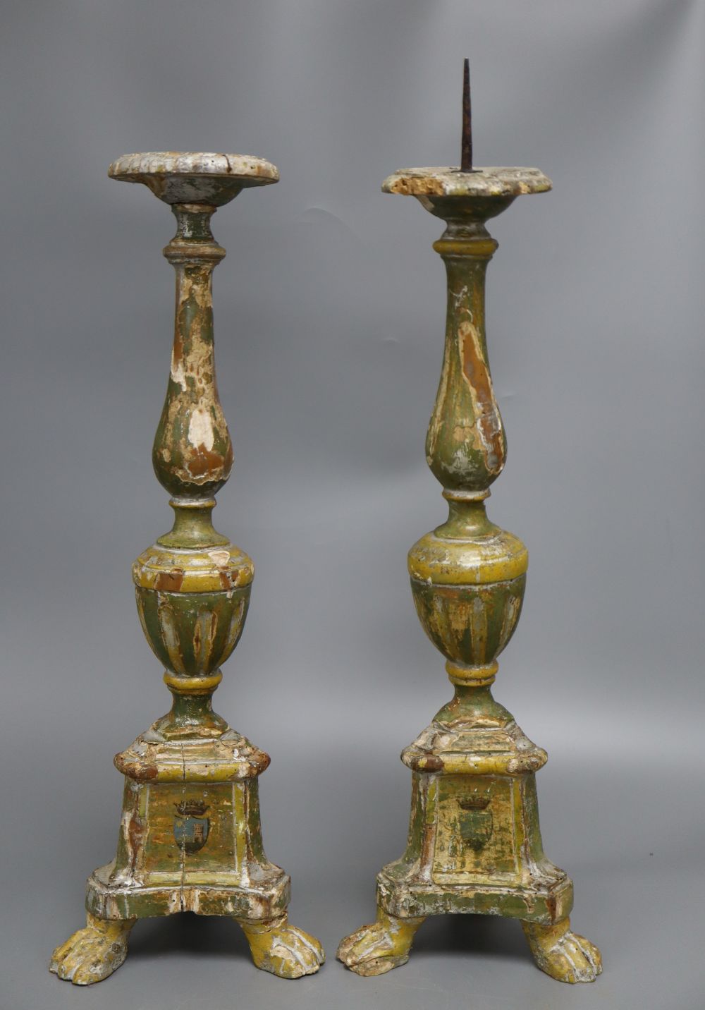 A pair of Italian painted pine pricket candlesticks, height 52cm